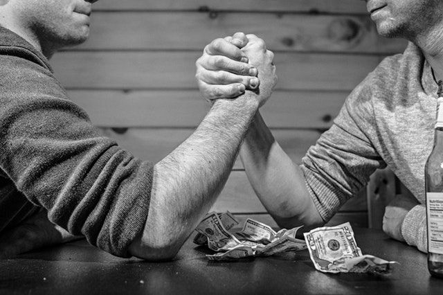 Sell House Fast We Buy Houses in Charleston South Carolina-two-guys-arm-wrestling